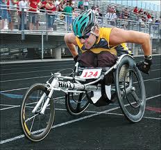 Man Racing in Wheelchair
