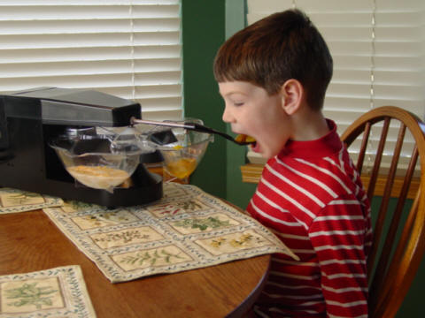 Small Child using the Mealtime Partner